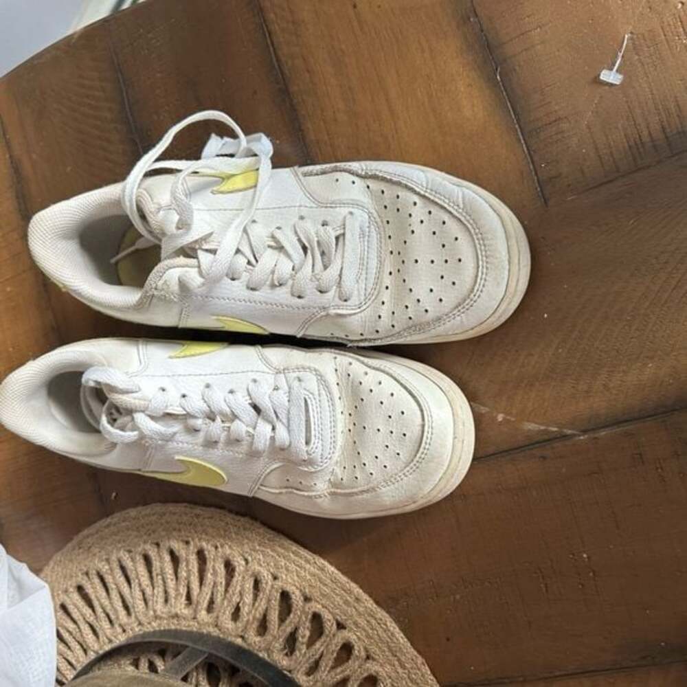 White and yellow Nikes